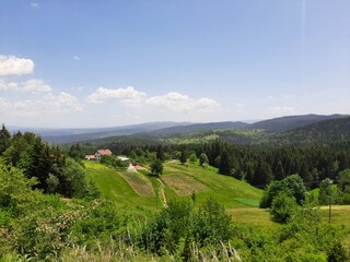 Fototapeta na wymiar View of the valley of the mountains and villages on mountain Zvijezda, Bosnia and Herzegovina