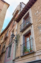 A facade decorated with Sgraffito, an architectural ornamental technique used to decorate the plastering and covering of walls. Toledo, Castilla La Mancha, Spain.