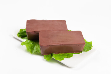 coagulated duck blood isolated on white background