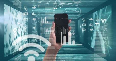 Hand holding a smartphone against data processing 