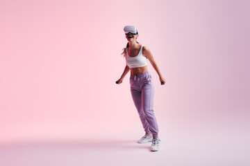 Happy young woman having fun in virtual reality