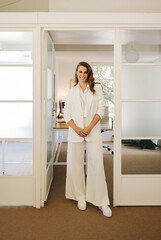 Businesswoman smiling at the camera in an office