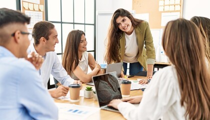 Group of business workers smiling happy working at the office.
