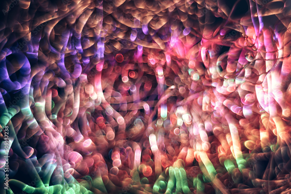 Aufkleber Beautiful optical abstract multicoloured  bokeh in the darkness  background.
