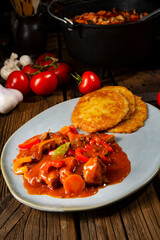 Hungarian goulash with potato pancakes