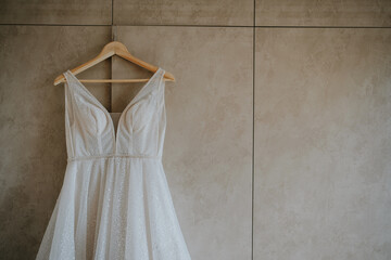 Obraz na płótnie Canvas wedding dress on hangers