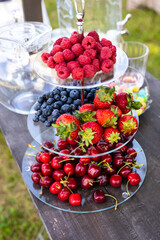 display stand on the table full of fresh fruit