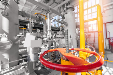 Yellow pipeline for natural gas with red valves. Concept industry power plant background