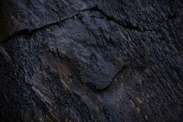 wet surface of dark stone. background