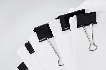 Blank Office papers fastened with black binders