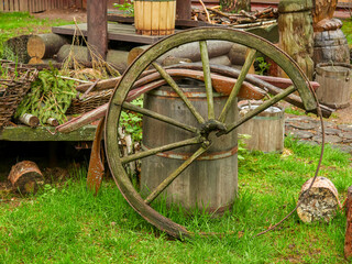 an old water well with a pulley and also a bucket