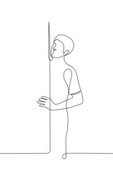 man stands behind the door tee holding it peering somewhere - one line drawing vector. concept supervision, surveillance, peeping