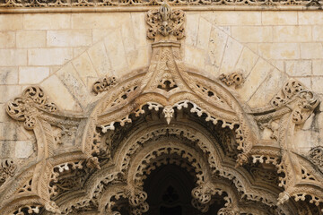 Obraz premium carved arches, vaults in Interior of the Unfinished chapels in Batalha monastery, Portugal
