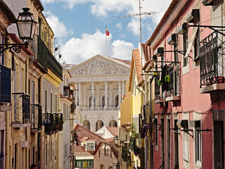 Asemblea de republica building in neoclassical style, framed by old typical Portuguese houses,...