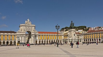 Fototapeta na wymiar Equestrian Statue of King José on Praça do Comércio, or commerce square,with Sao Jorge castle in the background on a sunny day in Lisbon, Portugal. Low angle view 