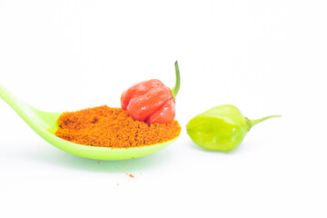 Spicy chili peppers or naga chili with chili powder isolate on white background