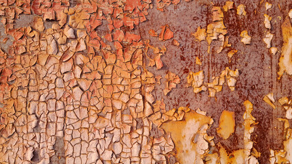 Rusty metal wall texture with peeling paint