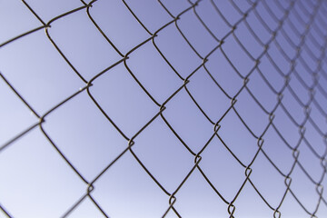 Fototapeta premium Metal fence with sky