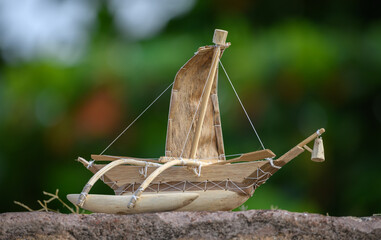 Handmade small traditional wooden boat showcase at Galle fort. miniature woodwork souvenirs.