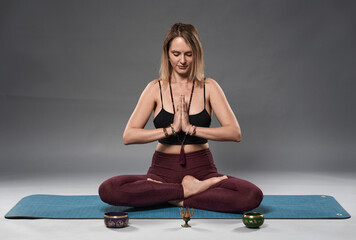 Young woman yoga trainer