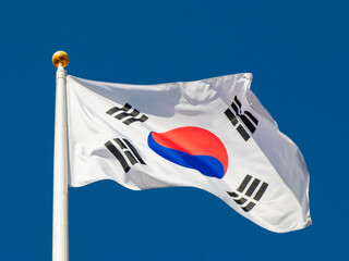 Flag of South Korea against blue sky background