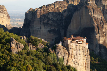 Fototapeta na wymiar Monastery on top of the cliff in Meteora valley in Greece, Kalambaka