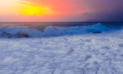 Fototapeta premium Famous amazing sunset and white sea foam on a Mediterranean dusk - Alanya, Antalya