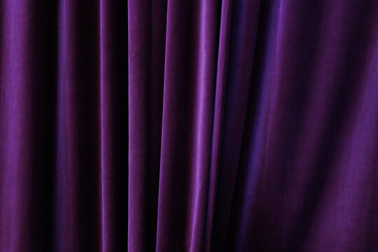 purple curtain for stage decoration.  purple curtain wall background and texture.