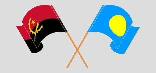 Crossed and waving flags of Angola and Palau - obrazy, fototapety, plakaty