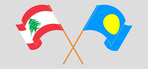Naklejka premium Crossed and waving flags of the Lebanon and Palau