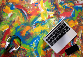 Computer laptop on abstract background texture. Laptop and art or relax concept