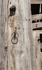 Photography of textured hardwood copy space with no people picture as a design element of the perfect simplicity of a death material with black metallic elements, ugly dirty cracked rustic surface.