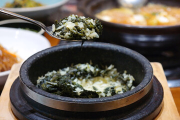 Hot Stone Pot Rice with thistle is a traditional Korean food.