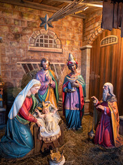 Naklejka premium Feldkirch, Austria - January 21, 2022: Christmas nativity scene in the church - symbol of the birth of Jesus