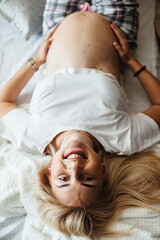 Pregnancy, rest, people and the concept of expectation are a close approximation. Portrait of happy...