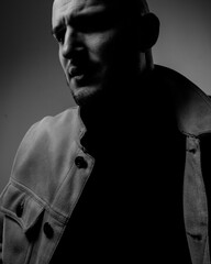 strong man in depression.brutal man feel bad emotion.black and photo of brutal man.emotional photo of man