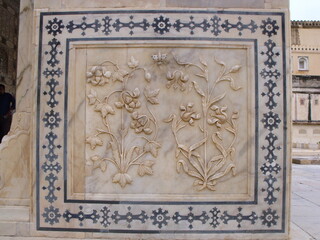 Amber fort, Jaipur, Rajasthan, India, August 17, 2011: Marble with flower reliefs at the Amber fort in Jaipur, India