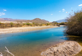 River among the mountains. Calm transparent ovda. Summer landscape. Boom Gorge, Kyrgyzstan.