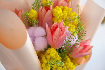 woman hands holding  tulips