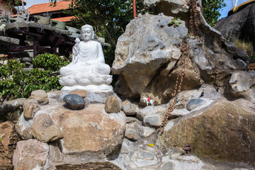 Fototapeta na wymiar White Guanyin statue of buddha in Da Lat, Vietnam