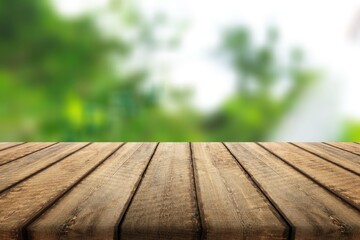 wooden table in front of blur landscape. Product display and presentation