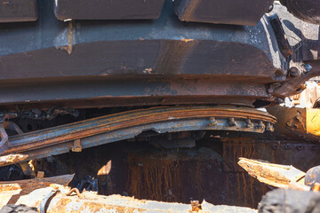 The war in Ukraine, the tank hull torn near the tower, the tank tower torn off the shoulder strap,...