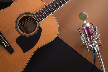 Flat lay, music background with acoustic guitar.