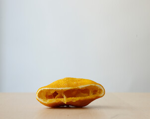 Squeezed lemon or used lemon. No people on isolated clean background