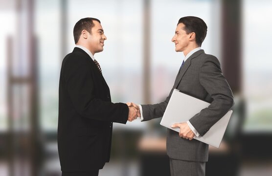 Business handshake. Buy and sell real estate International Investment contract, meeting.