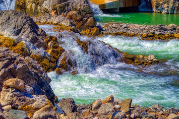 River waterfall passing over rocks.
