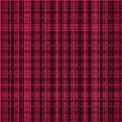 Tartan plaid pattern with texture and warm color.
