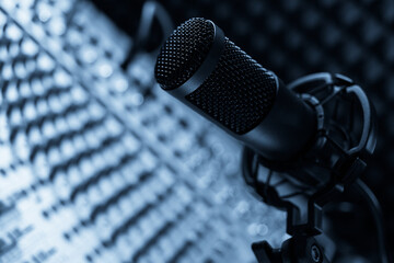 Microphone and sound mixer on desk table. Music audio concept in sound record studio
