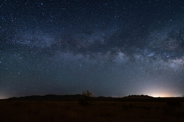 Obraz na płótnie Canvas Milky Way Galaxy Arc over Sonoita Arizona grasslands.