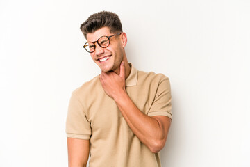 Obraz premium Young caucasian man isolated on white background suffers pain in throat due a virus or infection.